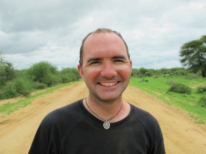 That's me looking really pleased to have reached Moyale on the Kenyan border; that's the difficult 600 km done, and not a bandit in sight.