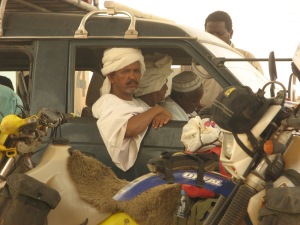 Petrol stations and 4x4/AWDs have replaced the camel and oasis, but local travellers look much the same - more comfortable too without  all the protective gear that we were wearing.